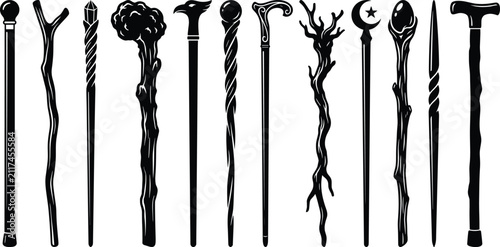 Fotografie Set of black silhouette walking sticks magic wizard staffs and vintage canes iso