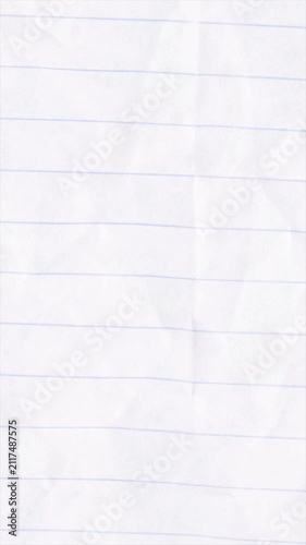 Close up of a lined paper texture from a notebook.