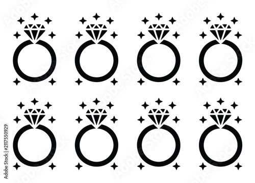 Foto Un patrón de ocho anillos de compromiso de diamantes brillantes sobre fondo blan