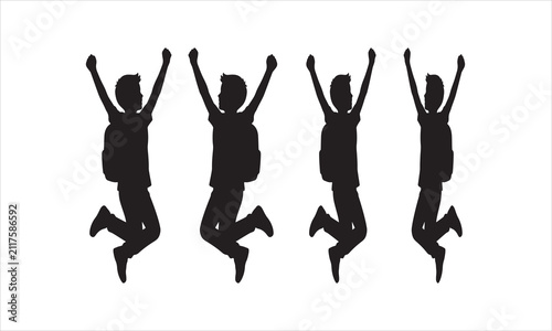 фотографія Silhouettes of happy children jumping with arms raised in unison