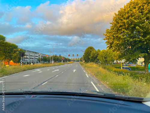 The modern city of Almere in a bright blue cloudy sky, at sunset  Almere, Flevoland, the Netherlands, July, 2026