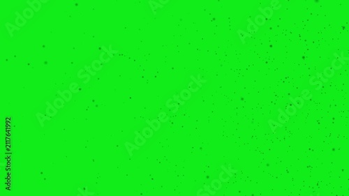 Black Particles Floating On Green Screen Background
