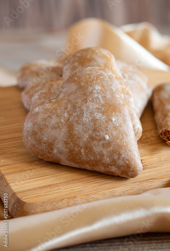 Heart gingerbread cookies with icing sugar and ginger