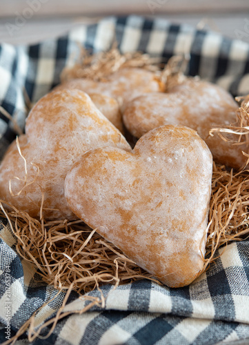 Heart gingerbread cookies with icing sugar and ginger