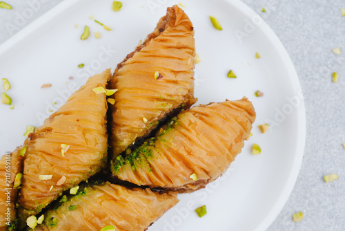 фотографія Turkish pistachio baklava pieces on a white plate