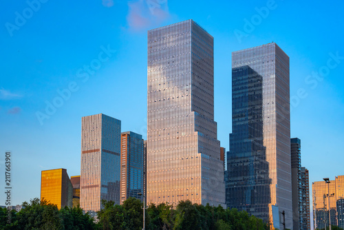 modern office building exterior in downtown district in Chengdu under dusk light