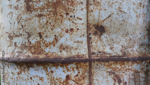 Rusty sheet metal, full frame textured backdrop of rusty bent iron with scratched and worn surface, graphic blank background of corroded old metal material, oxidized metallic canvas