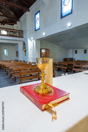 Obraz na płótnie Chalice and book on altar preparing for service