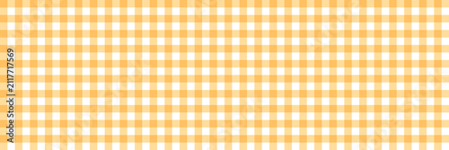 Peach and white gingham check plaid pattern background texture for fabric, picnic, and wallpaper design