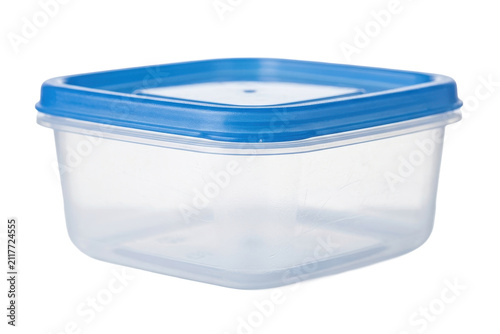 Empty plastic food storage container with blue lid