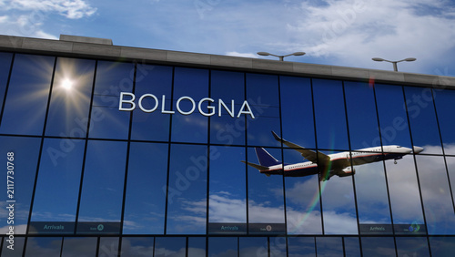 Airplane landing at Bologna Italy airport mirrored in terminal