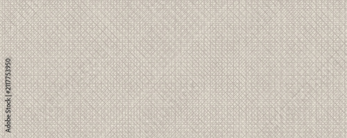 Foto Texture of natural beige woven linen fabric with detailed crosshatch pattern against light beige neutral background