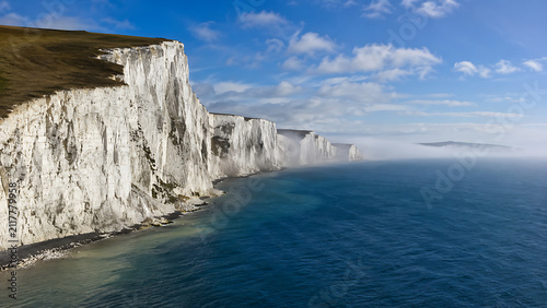 White Cliffs of Dover, England — massive white chalk cliffs overlooking deep blue ocean water