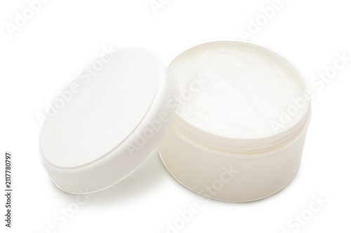 A white plastic container with cosmetic cream. On a white background.