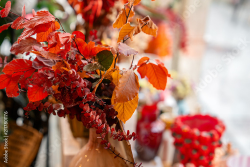 Autumn floral arrangement with red leaves