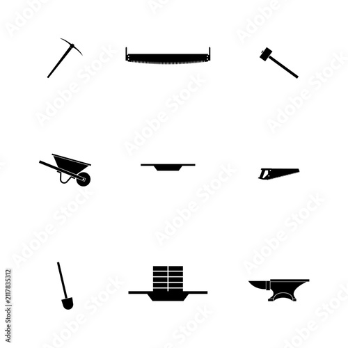Collection of flat black construction and masonry tools icons isolated on white background. Includes pickaxe, hand saw, mallet, wheelbarrow, shovel, bricks, anvil and masonry tools.