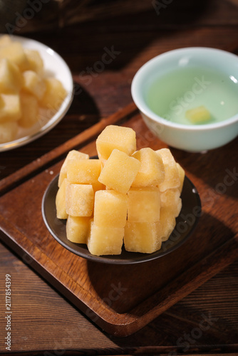 Photography Traditional Chinese Pear Candy Cubes with Tea - Handmade Dangshan Confection on