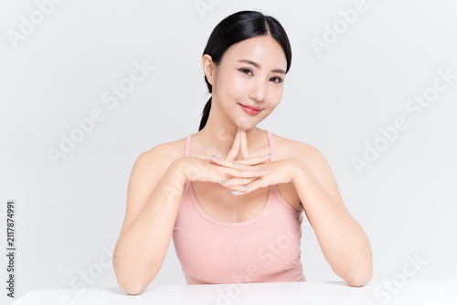Portrait beautiful young Asian woman natural glowing makeup and healthy facial skin, for beauty makeup and skincare concept, isolated on white background.