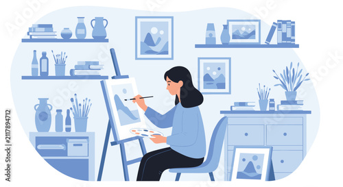 Talented female artist sitting in her cozy art studio and painting a beautiful mountain landscape on a canvas.