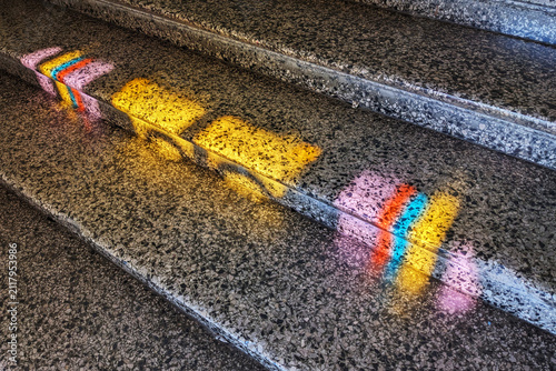 Reflection of stained glass on a stairs