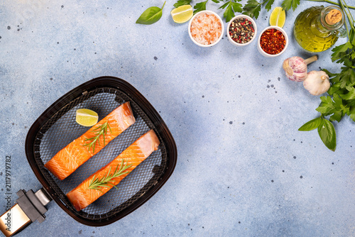 Raw salmon fillets preparing for air fryer cooking