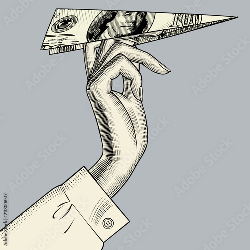 Woman's hand with a paper plane made from a dollar bill. Vector illustration in black and white vintage engraving style.