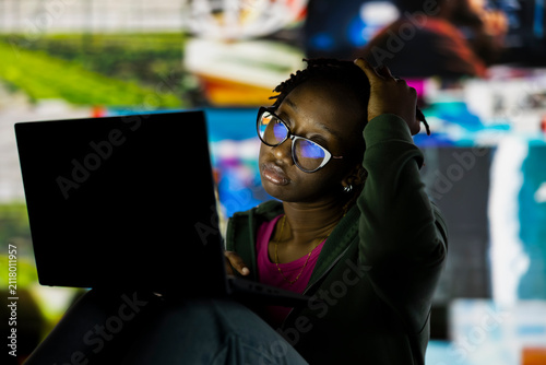 Canvastavla Woman wasting time watching multimedia content all day on laptop; Couch potato person feeling bored after interacting all day with online websites, watching videos on notebook