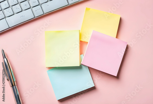 Colorful sticky notes, pen,...
