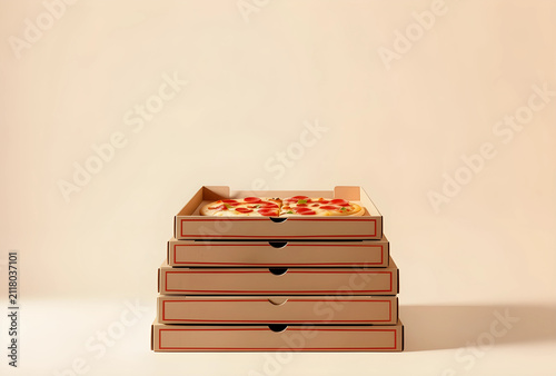 Stack of pizza boxes with a...