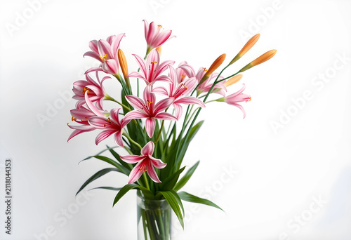 Pink striped lilies in a gl...