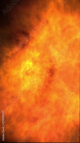 Close-up of burning flame with intense orange and yellow fire texture, blurred background