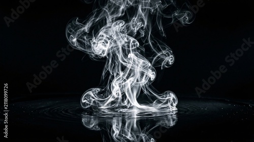 Elegant white smoke curls upward from a dark reflective surface against a deep black background