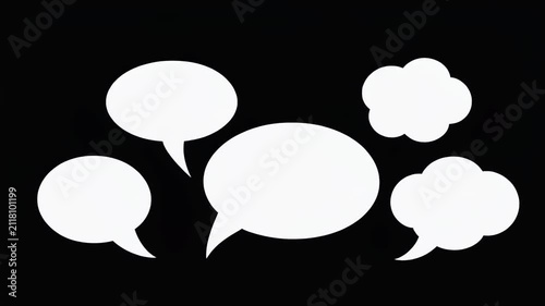 Collection of white speech and thought bubbles on black background