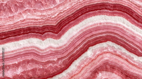 Close-up flat lay of rhodochrosite mineral stone texture, distinctive candy-cane pink and white curved banded layers, studio flat lighting, ultra high resolution stone background