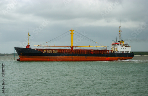 Cargo ship assisted by tugboat at Port of Cabedelo, Paraíba, Brazil November 24, 2004