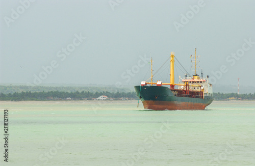 Cargo ship assisted by tugboat at Port of Cabedelo, Paraíba, Brazil November 24, 2004
