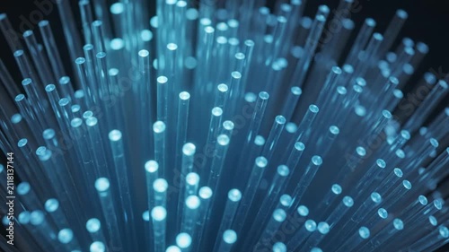Extreme Macro of Glowing Fiber Optic Cable with Blue Light Points