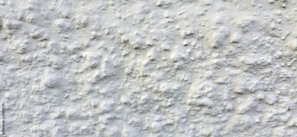 Fototapeta premium White stucco wall texture creating unique background pattern
