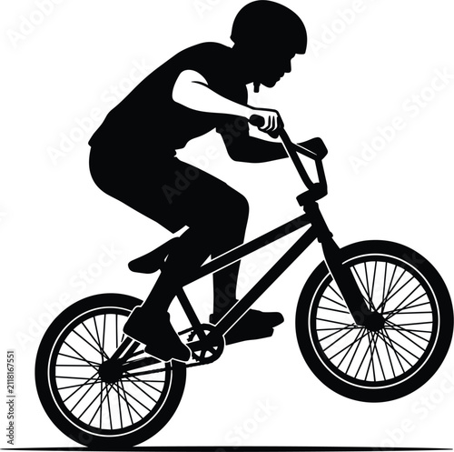 Obraz na płótnie BMX rider performing a manual wheelie stunt trick silhouette vector illustration