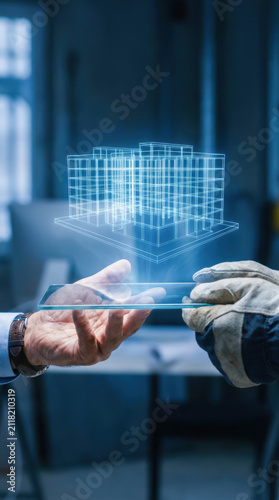 Construction planning business partnership  glass panel handoff in blue workspace with digital building model