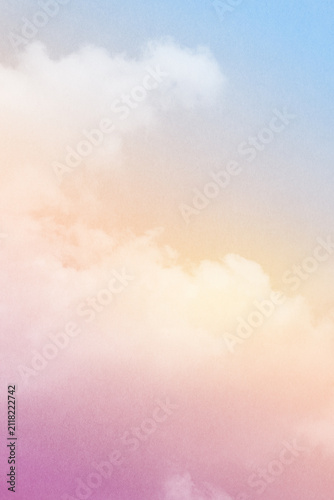 fantasy blurred cloudy sky with blue, orange and purple gradient color with grunge paper texture when zoom 100%,  vertical nature abstract background