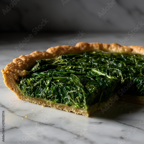 Freshly baked spinach quich...