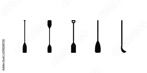 Set of five different oar and paddle silhouettes for rowing and water sports equipment isolated on a plain white background
