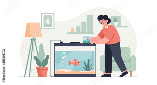 Person caring for a goldfish in a home aquarium.