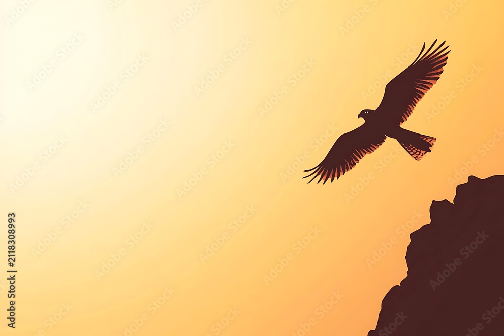 Fototapeta premium Bird in flight at sunset