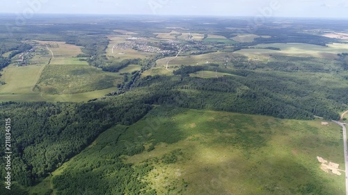 High altitude sideways drone flight over landscape