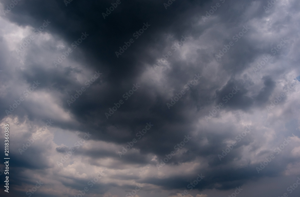 Obraz premium Dark sky with stormy clouds. Dramatic sky rain,Dark clouds before a thunder-storm,clouds before rain
