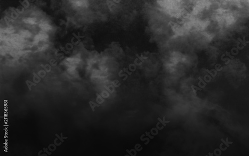 фотографія Ethereal smoke fragments and wisps suspended in darkness forming abstract patterns and textures for versatile use in artistic and visual design applications