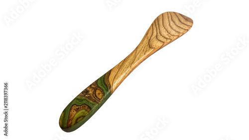 Картината върху платно Traditional curved wooden cooking stirring spoon isolated on transparent backgro