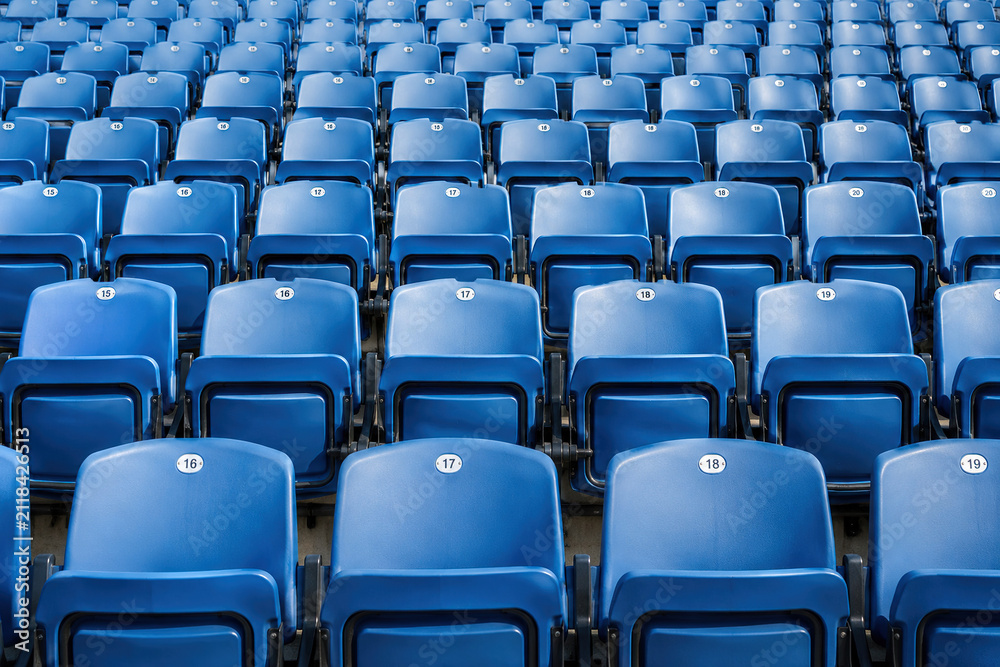 Fototapeta premium Empty Rows of Blue Stadium Seats Ready for Event